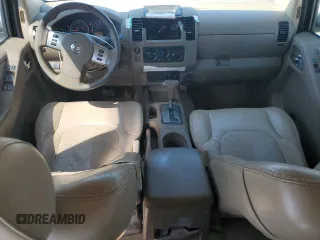 2007 Nissan Frontier SE with VIN 1N6AD09U97C464179, listed as a Copart auction lot 62142395 with 294,908 mi miles and Salvage title. Bid and sale history available at DreamBid. Image 8.