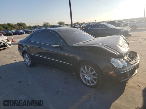 2007 Mercedes-Benz CLK 350 with VIN WDBTJ56H37F229024, listed as a Copart auction lot 71610814 with 90,017 mi miles and Salvage Title. Bid and sale history available at DreamBid. Image 4.