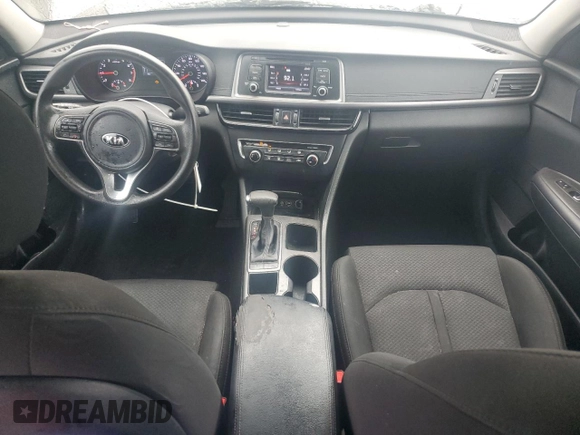 2017 Kia Optima LX z VIN 5XXGT4L35HG133558, wystawiony jako Copart lot #57454245 z przebiegiem 264 541 mil mil oraz Szkoda całkowita • Salvage title. Historia ofert i sprzedaży dostępna na DreamBid. Obrazek 8.