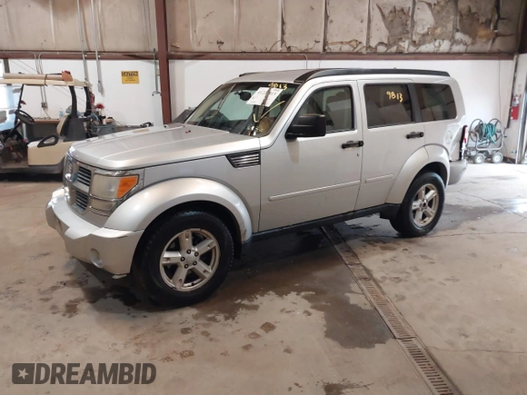 2007 Dodge Nitro SLT z VIN 1D8GU58K97W616455, wystawiony jako IAAI lot #41229813 z przebiegiem 199 421 mil mil oraz . Historia ofert i sprzedaży dostępna na DreamBid. Obrazek 2.
