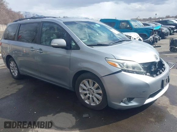 2015 Toyota Sienna XLE with VIN 5TDYK3DC2FS640204, listed as a IAAI auction lot 41772349 with 104,156 mi miles. Bid and sale history available at carsss.com. Image 1.