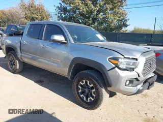 2023 Toyota Tacoma 4WD SR with VIN 3TMCZ5AN6PM548229, listed as a IAAI auction lot 41487261 with 14,741 mi miles. Bid and sale history available at carsss.com. Image 1.