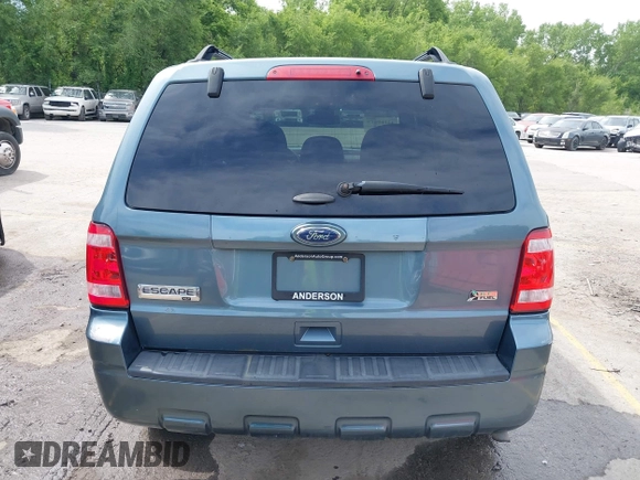 2012 Ford Escape XLT z VIN 1FMCU9DG7CKB91272, wystawiony jako IAAI lot #42168619 z przebiegiem 119 011 mil mil oraz . Historia ofert i sprzedaży dostępna na DreamBid. Obrazek 16.