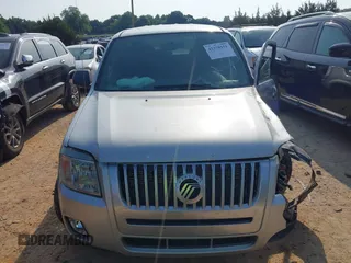 2009 Mercury Mariner z VIN 4M2CU91769KJ21418, wystawiony jako IAAI lot #42378151 z przebiegiem 200 771 mil mil oraz . Historia ofert i sprzedaży dostępna na DreamBid. Obrazek 12.