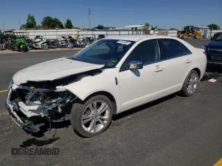 2012 Lincoln MKZ z VIN 3LNHL2GC4CR814562, wystawiony jako Copart lot #60533985 z przebiegiem 96 891 mil mil oraz Szkoda całkowita • Salvage title. Historia ofert i sprzedaży dostępna na DreamBid. Obrazek 1.