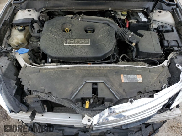 2013 Lincoln MKZ z VIN 3LN6L2J91DR823693, wystawiony jako Copart lot #55827045 z przebiegiem 173 978 mil mil oraz Szkoda całkowita • Salvage title. Historia ofert i sprzedaży dostępna na DreamBid. Obrazek 11.