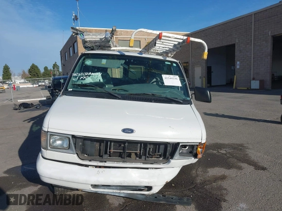 2000 Ford Econoline Cargo with VIN 1FTRE1427YHA09155, listed as a IAAI auction lot 41544236 with 32,275 mi miles. Bid and sale history available at carsss.com. Image 11.