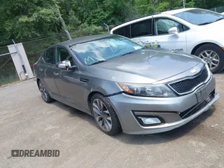 2014 Kia Optima SX with VIN 5XXGR4A75EG270693, listed as a IAAI auction lot 42606134 with 126,486 mi miles and . Bid and sale history available at DreamBid. Image 1.