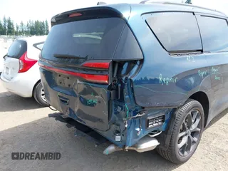 2023 Chrysler Pacifica Limited with VIN 2C4RC3GGXPR555282, listed as a IAAI auction lot 42452848 with 18,373 mi miles and . Bid and sale history available at DreamBid. Image 6.