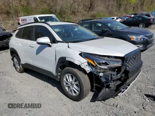 2022 Toyota Corolla Cross LE with VIN 7MUCAABG2NV024823, listed as a Copart auction lot 53458775 with 24,562 mi miles and Non repairable. Bid and sale history available at DreamBid. Image 4.