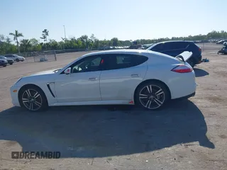 2013 Porsche Panamera with VIN WP0AA2A7XDL014047, listed as a IAAI auction lot 42010031 with 118,681 mi miles and . Bid and sale history available at DreamBid. Image 14.