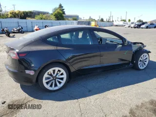 2023 Tesla Model 3 z VIN 5YJ3E1EA2PF449956, wystawiony jako Copart lot #64069715 z przebiegiem 40 098 mil mil oraz Szkoda całkowita • Salvage title. Historia ofert i sprzedaży dostępna na DreamBid. Obrazek 3.