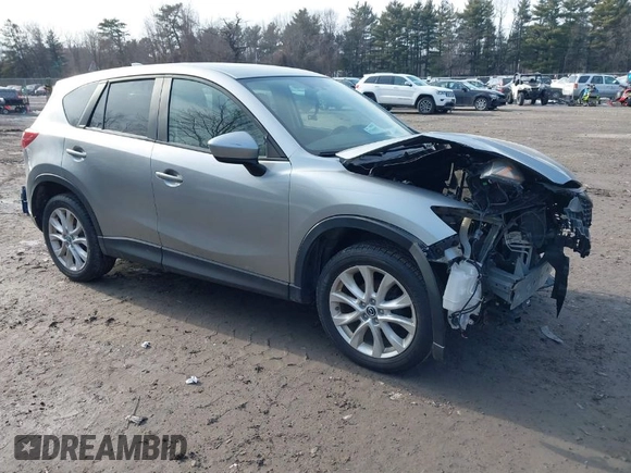 2013 Mazda CX-5 Grand Touring with VIN JM3KE4DE2D0115154, listed as a IAAI auction lot 41706007 with 153,532 mi miles. Bid and sale history available at carsss.com. Image 1.