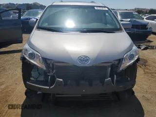 2012 Toyota Sienna XLE AAS with VIN 5TDYK3DC1CS204598, listed as a Copart auction lot 62293015 with 76,108 mi miles and Salvage title. Bid and sale history available at DreamBid. Image 5.