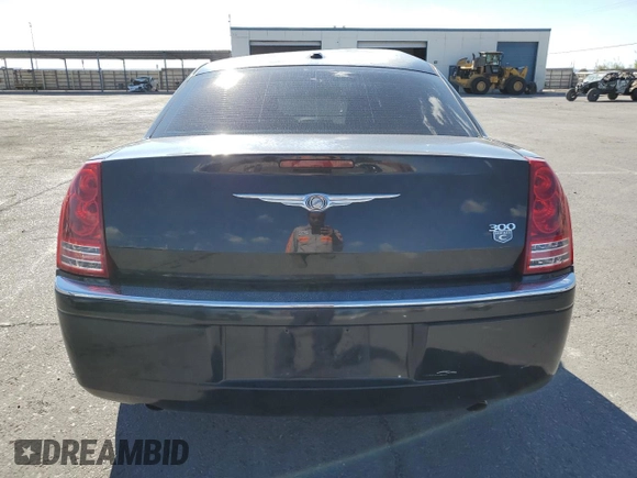 2009 Chrysler 300 with VIN 2C3KA63T69H626101, listed as a Copart auction lot 70259914 with 172,078 mi miles and Salvage Title. Bid and sale history available at carsss.com. Image 6.