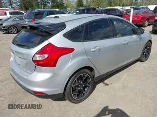 2013 Ford Focus SE with VIN 1FADP3K25DL335939, listed as a IAAI auction lot 42088780 with 149,957 mi miles. Bid and sale history available at carsss.com. Image 4.