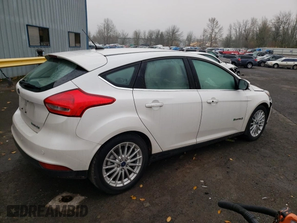 2015 Ford Focus Electric z VIN 1FADP3R41FL232835, wystawiony jako Copart lot #70969312 z przebiegiem 39 606 mil mil oraz . Historia ofert i sprzedaży dostępna na DreamBid. Obrazek 3.
