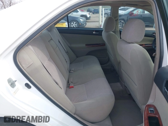 2003 Toyota Camry LE with VIN 4T1BE32K13U250477, listed as a IAAI auction lot 41996101 with 212,951 mi miles and . Bid and sale history available at DreamBid. Image 8.