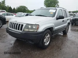 2004 Jeep Grand Cherokee Laredo z VIN 1J4GW48S64C132172, wystawiony jako IAAI lot #42163524 z przebiegiem 170 952 mil mil oraz . Historia ofert i sprzedaży dostępna na DreamBid. Obrazek 2.