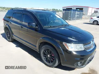 2015 Dodge Journey SXT with VIN 3C4PDCBG0FT595359, listed as a IAAI auction lot 41987773 with 135,528 mi miles. Bid and sale history available at carsss.com. Image 1.