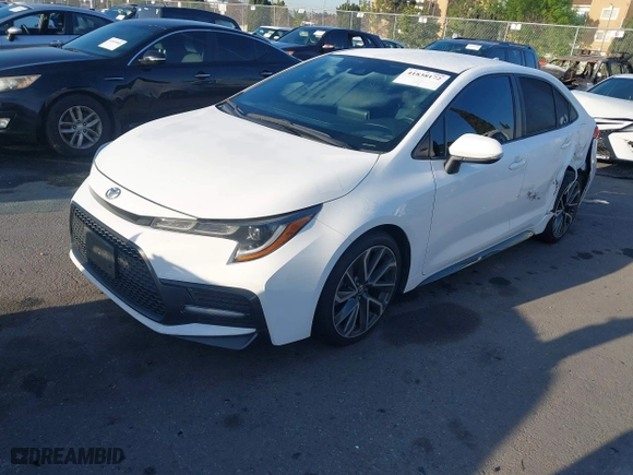 2021 Toyota Corolla SE with VIN 5YFS4MCE2MP068307, listed as a IAAI auction lot 41838172 with 82,638 mi miles. Bid and sale history available at carsss.com. Image 2.