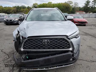 2022 Toyota Corolla Cross XLE with VIN 7MUDAABG2NV009663, listed as a Copart auction lot 55945735 with 59,473 mi miles and Salvage title. Bid and sale history available at DreamBid. Image 5.