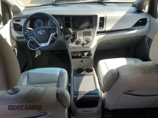 2015 Toyota Sienna Limited with VIN 5TDDK3DCXFS114708, listed as a Copart auction lot 55411465 with Not Provided miles and Salvage Title. Bid and sale history available at DreamBid. Image 8.