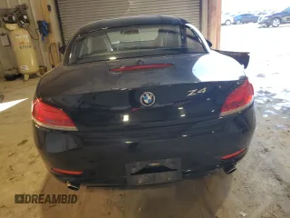 2015 BMW Z4 sDrive35i with VIN WBALM7C52FJ799104, listed as a Copart auction lot 88354535 with 56,560 mi miles and Salvage Title. Bid and sale history available at carsss.com. Image 6.