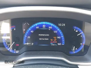 2022 Toyota Corolla Cross XLE z VIN 7MUDAABG4NV004836, wystawiony jako IAAI lot #42546573 z przebiegiem 23 821 mil mil oraz . Historia ofert i sprzedaży dostępna na DreamBid. Obrazek 7.