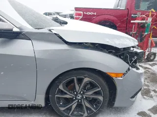 2019 Honda Civic Sport with VIN 2HGFC2F85KH605786, listed as a IAAI auction lot 41621480 with 66,438 mi miles and . Bid and sale history available at DreamBid. Image 22.