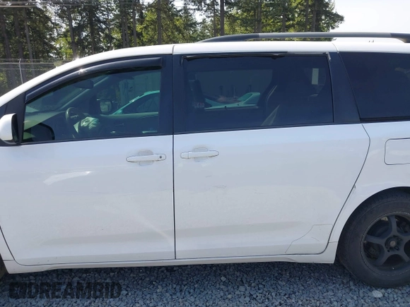 2013 Toyota Sienna XLE AAS with VIN 5TDYK3DC9DS292737, listed as a IAAI auction lot 42160582 with 200,321 mi miles and . Bid and sale history available at DreamBid. Image 15.