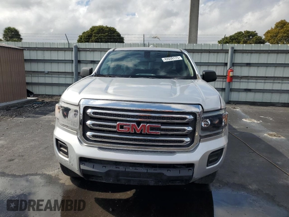 2019 GMC Canyon 2WD with VIN 1GTG5BEN7K1284210, listed as a Copart auction lot 42039175 with 75,503 mi miles and Salvage Title. Bid and sale history available at carsss.com. Image 5.