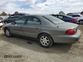 2001 Mercury Sable LS with VIN 1MEFM53U21G623749, listed as a Copart auction lot 72206684 with 97,044 mi miles and Salvage title. Bid and sale history available at DreamBid. Image 2.
