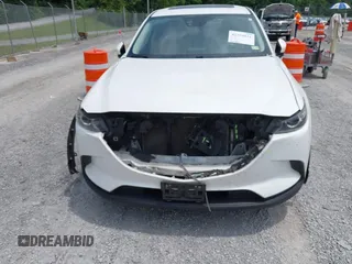 2016 Mazda CX-9 Touring с VIN JM3TCBCY1G0116889, выставлен на аукционе IAAI как лот 42394821 с пробегом 210 861 миль миль и . История ставок и продаж доступна на DreamBid. Изображение 6.