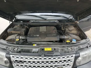 2012 Land Rover Range Rover SC with VIN SALMF1E44CA377469, listed as a Copart auction lot 71765504 with 96,648 mi miles and Salvage title. Bid and sale history available at DreamBid. Image 12.