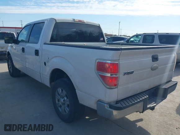 2012 Ford F-150 XL with VIN 1FTFW1CF9CFA94640, listed as a IAAI auction lot 41703729 with 216,291 mi miles. Bid and sale history available at carsss.com. Image 3.