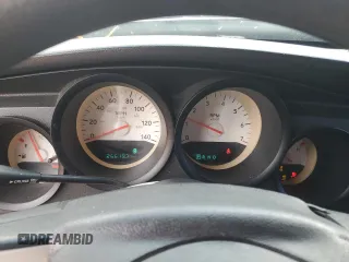 2006 Dodge Charger z VIN 2B3KA43G86H528185, wystawiony jako Copart lot #58007605 z przebiegiem 266 197 mil mil oraz Szkoda całkowita • Salvage title. Historia ofert i sprzedaży dostępna na DreamBid. Obrazek 9.