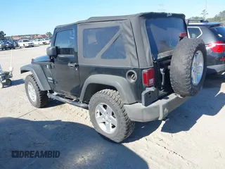 2012 Jeep Wrangler Sport with VIN 1C4AJWAG0CL247103, listed as a IAAI auction lot 42181637 with 159,003 mi miles and . Bid and sale history available at DreamBid. Image 3.