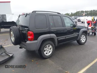 2003 Jeep Liberty Sport with VIN 1J4GK48KX3W656837, listed as a IAAI auction lot 40785615 with 164,450 mi miles and . Bid and sale history available at DreamBid. Image 4.