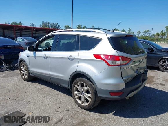 2016 Ford Escape Titanium with VIN 1FMCU0JX2GUC39416, listed as a IAAI auction lot 41793375 with 146,877 mi miles. Bid and sale history available at carsss.com. Image 3.