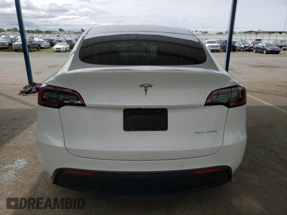 2022 Tesla Model Y Long Range with VIN 7SAYGAEE9NF384400, listed as a Copart auction lot 51961545 with 31,758 mi miles and Salvage Title. Bid and sale history available at DreamBid. Image 6.