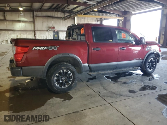 2017 Nissan Titan Platinum Reserve with VIN 1N6AA1E52HN501110, listed as a Copart auction lot 48202935 with 83,674 mi miles and Salvage title. Bid and sale history available at DreamBid. Image 3.
