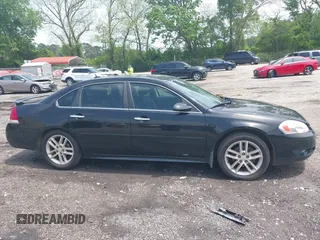 2014 Chevrolet Impala LTZ with VIN 2G1WC5E39E1103505, listed as a IAAI auction lot 42107207 with 216,544 mi miles and . Bid and sale history available at DreamBid. Image 13.