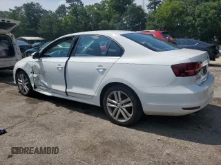 2017 Volkswagen Jetta SEL with VIN 3VWL17AJ2HM211751, listed as a Copart auction lot 61907755 with 64,668 mi miles and Salvage title. Bid and sale history available at DreamBid. Image 2.