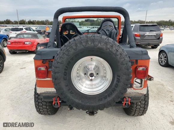 1984 Jeep CJ 4WD with VIN 1JCCM87E9ET003890, listed as a Copart auction lot 78302994 with NaN miles and Salvage Title. Bid and sale history available at carsss.com. Image 6.