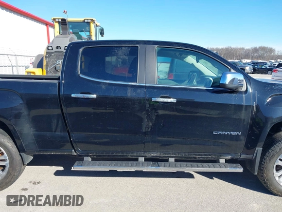 2015 GMC Canyon 4WD SLT z VIN 1GTG6CE33F1134747, wystawiony jako IAAI lot #41502300 z przebiegiem 143 027 mil mil oraz . Historia ofert i sprzedaży dostępna na DreamBid. Obrazek 14.