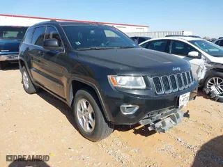 2014 Jeep Grand Cherokee Laredo with VIN 1C4RJEAG1EC348070, listed as a IAAI auction lot 41950898 with 129,883 mi miles. Bid and sale history available at carsss.com. Image 1.