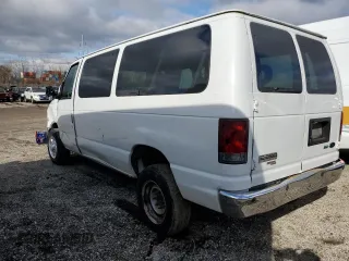 2011 Ford Econoline Passenger XL with VIN 1FBNE3BLXBDA75840, listed as a Copart auction lot 72030614 with 57,183 mi miles and Salvage Title. Bid and sale history available at DreamBid. Image 2.