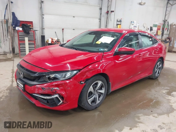 2020 Honda Civic LX with VIN 2HGFC2F6XLH551000, listed as a IAAI auction lot 42279270 with 76,134 mi miles and . Bid and sale history available at DreamBid. Image 17.