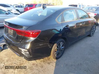 2021 Kia Forte LXS with VIN 3KPF24AD4ME283402, listed as a IAAI auction lot 41176665 with 84,620 mi miles. Bid and sale history available at carsss.com. Image 4.
